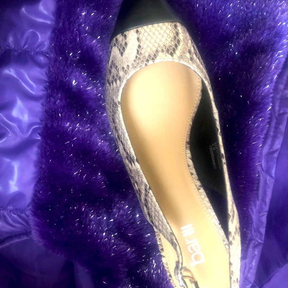 Woman’s snake print sling back heels